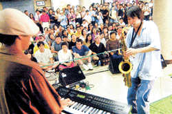 Musicians playing for a large crowd in Korea
